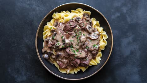 delicious beef stroganoff with creamy mushroom sauce on egg noodles