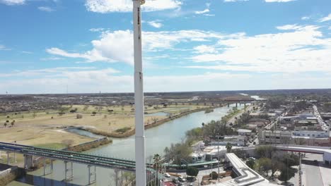 Workers-performing-maintenance-and-repairs-on-the-largest-flagpole-in-Mexico,-located-in-Piedras-Negras,-Coahuila