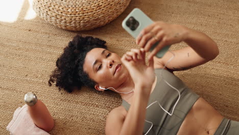 woman relaxing and using mobile phone