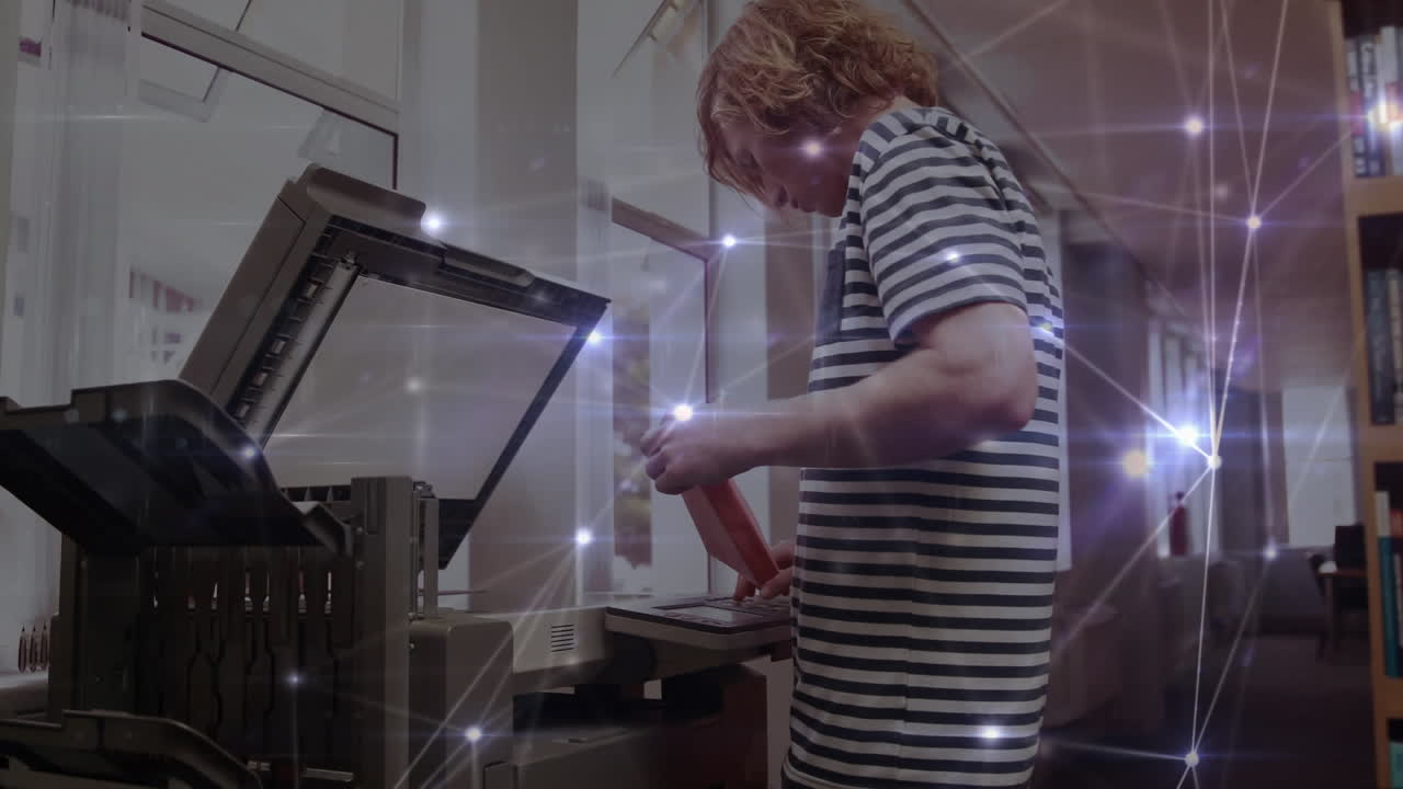 Animation of network of connections over male student using copying machine
