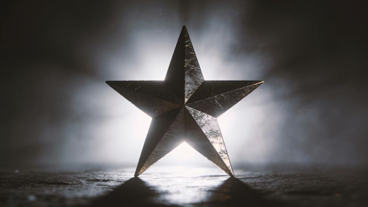 Pulsing backlight sending metallic five-point star shimmering on textured tabletop, with halo haze