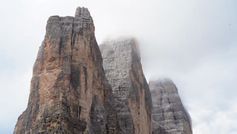 close up of tre cime di lavaredo in clouds in south tyrol