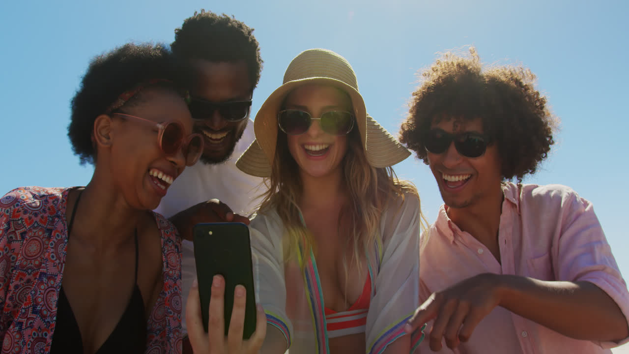 Group friends taking selfie with phone 4k