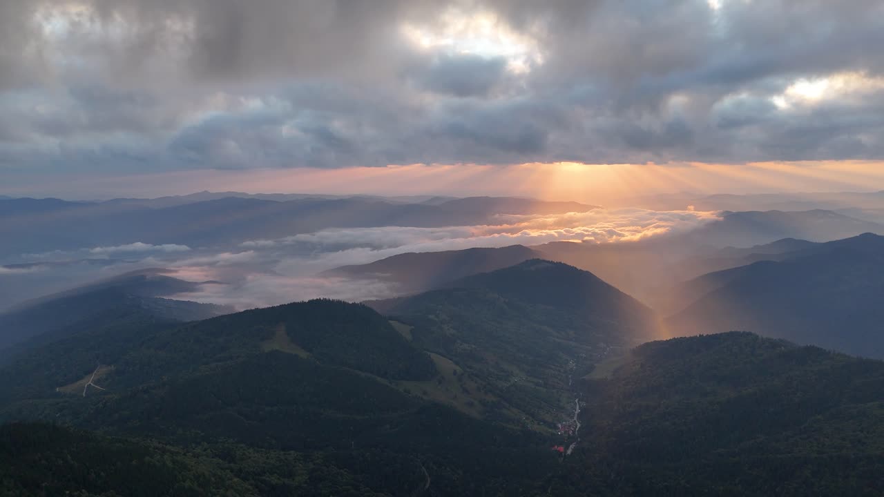 Drone shot at sunrise near Dochia Chalet, Ceahlău Mountains, Romania, Izvorul Muntelui view