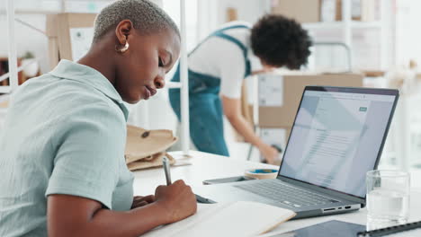 Planning,-writing-and-black-woman-working