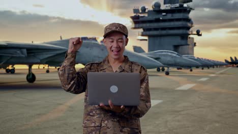 military personnel celebrating success on aircraft carrier deck