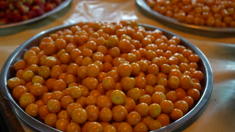 golden berries on big plate. physalis peruviana. close up