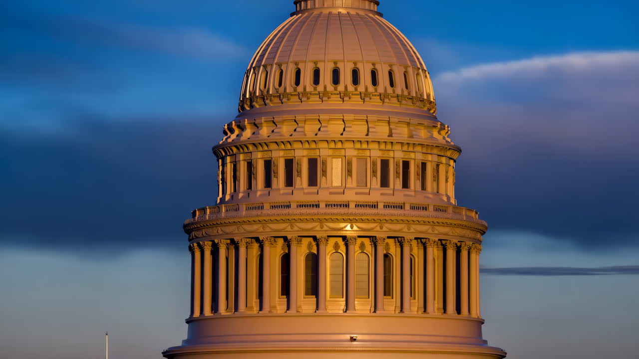 US Capitol Building Dome at Dusk with Illuminated Windows
