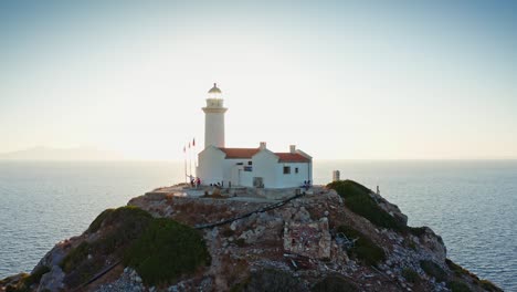 aerial view of lighthouse at sunset