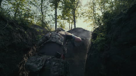 soldier in a trench in the forest