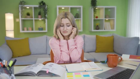 young girl wants silence while studying.