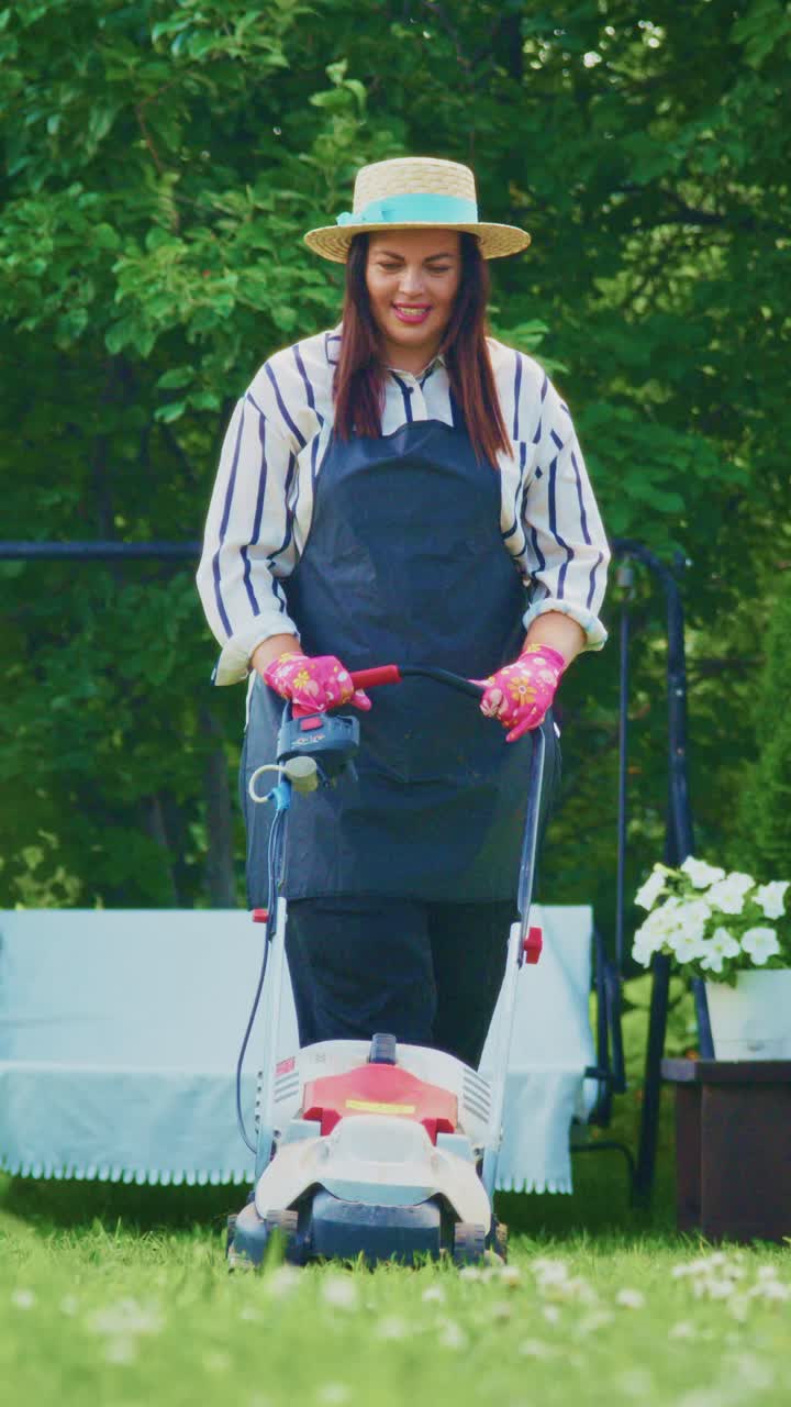 A Passionate Gardener Tends to Her Lush Outdoor Space while Mowing the Lawn, Embracing Nature and the Joy of Gardening with Care and Enthusiasm