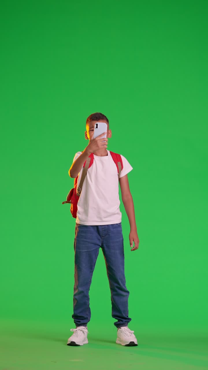 Boy Taking Selfie on Green Screen