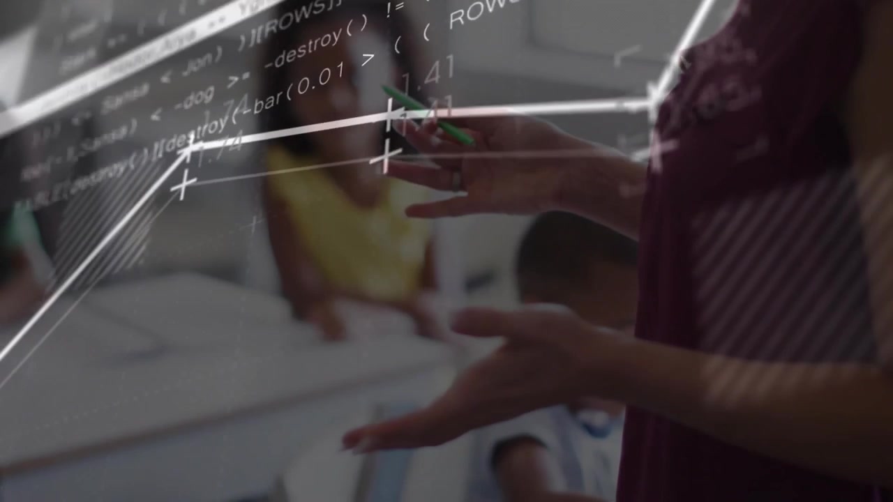 mother holding green pen and gesturing above white table displaying code, charts in technology lab
