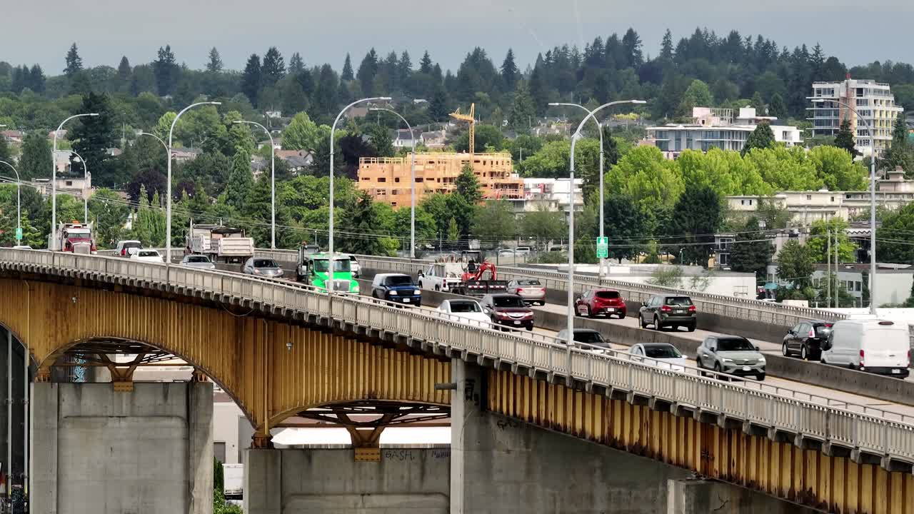 Traffic Over Road Bridge Along River Drive In Richmond, British Columbia, Canada. High Angle Wide Shot