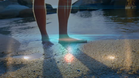 animación de puntos de luz sobre mujer caucásica en la playa