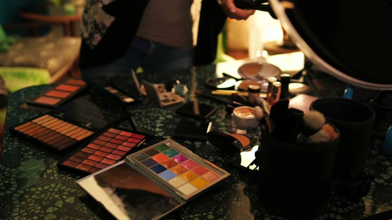 Female blogger arranging cosmetics on the table 4k