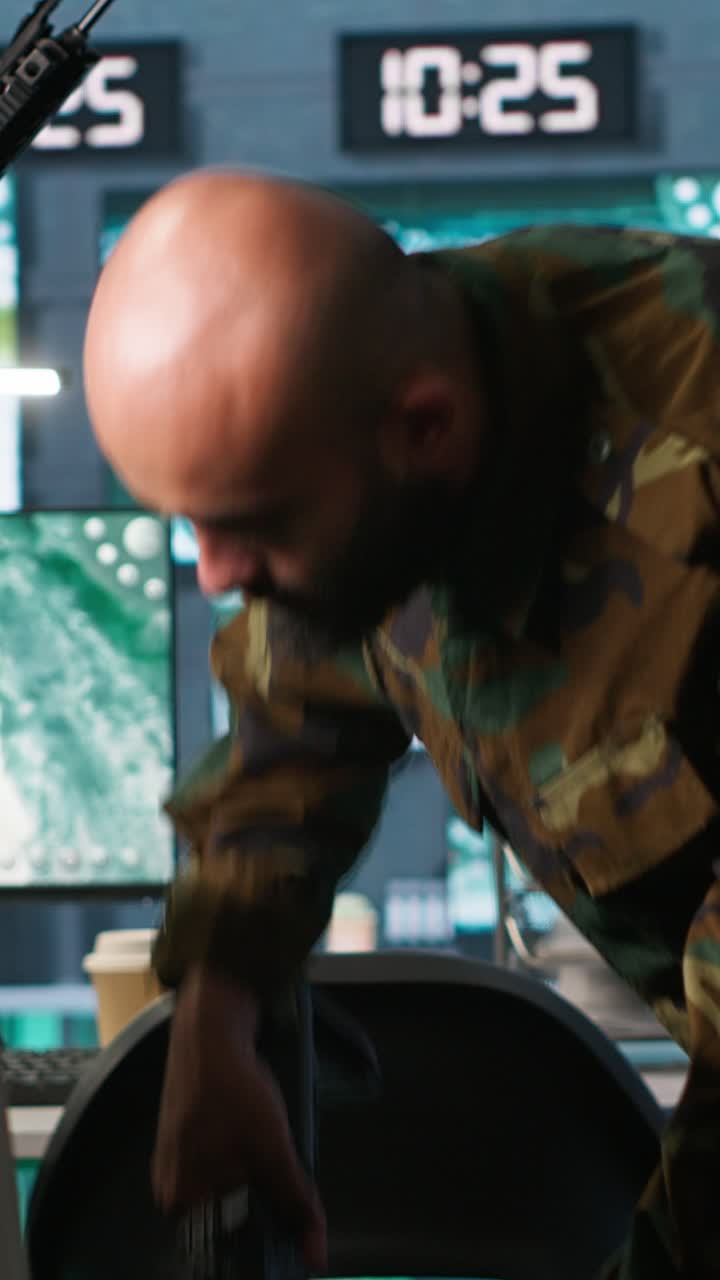 Vertical video Military units loading guns, preparing for enemy suppression mission
