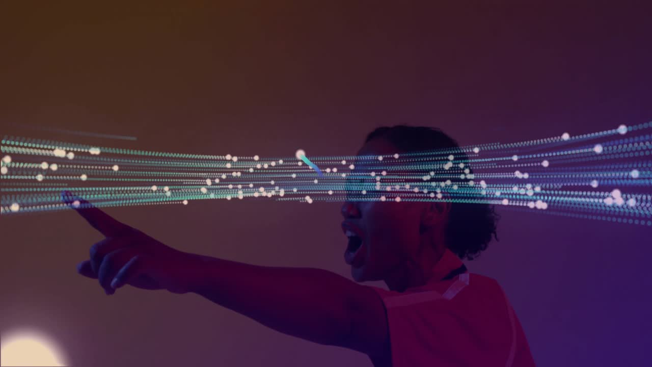 Mid-adult woman clenching fist controlling data ring in tech UI, swirling into light streams