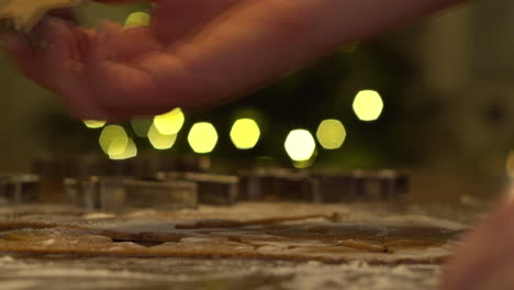 Cutting-flattened-gingerbread-dough-with-star-shape-cutting-form