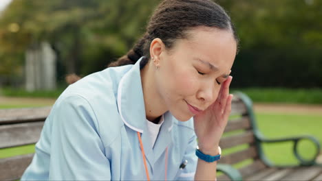 headache, tired and nurse with woman on park bench