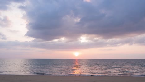 heavenly clouds sky in twilight sunset time at the sea. colorful fluffy clouds and sweet pink sunlight shine on the sea and sky. moving fast clouds on a cloudy day. dramatic groud of clouds