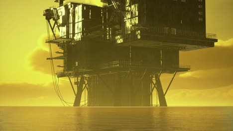 oil rig stands tall against a vibrant yellow sunset in the open sea