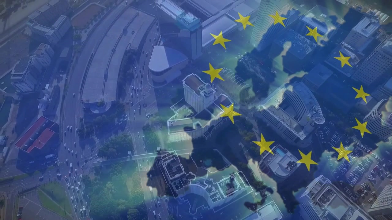 Anello stellare che appare gradualmente su un paesaggio urbano, causando un contorno pulsante dell'UE e un fascio di luce che mostra l'unità europea.