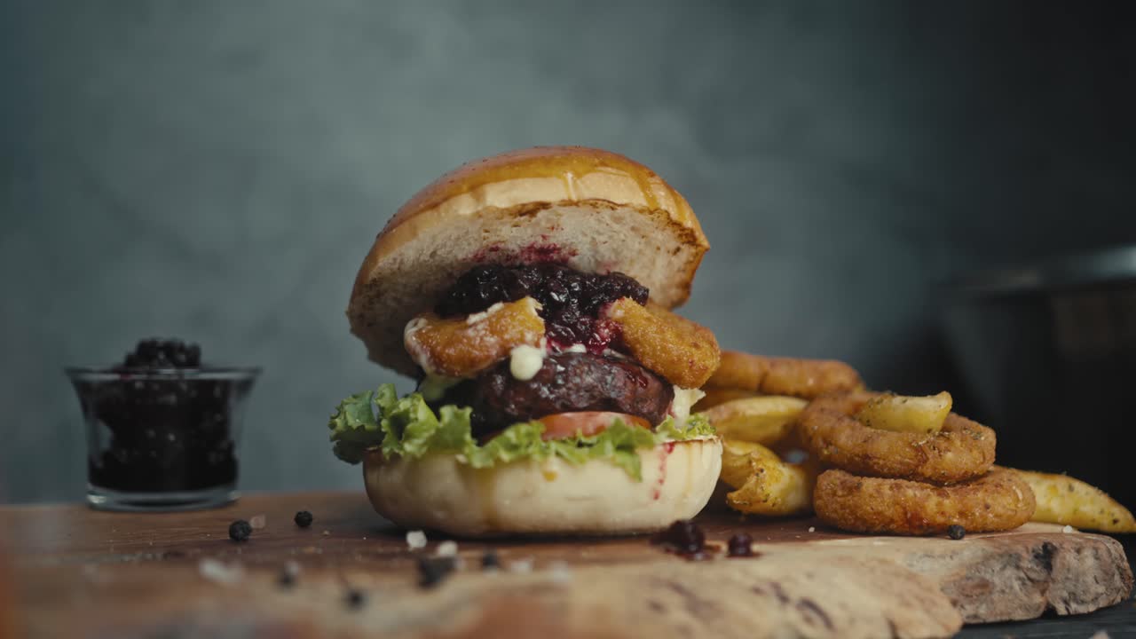 A Delicious Gourmet Burger with Onion Rings