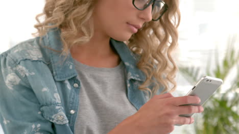 casual hipster using her smart phone