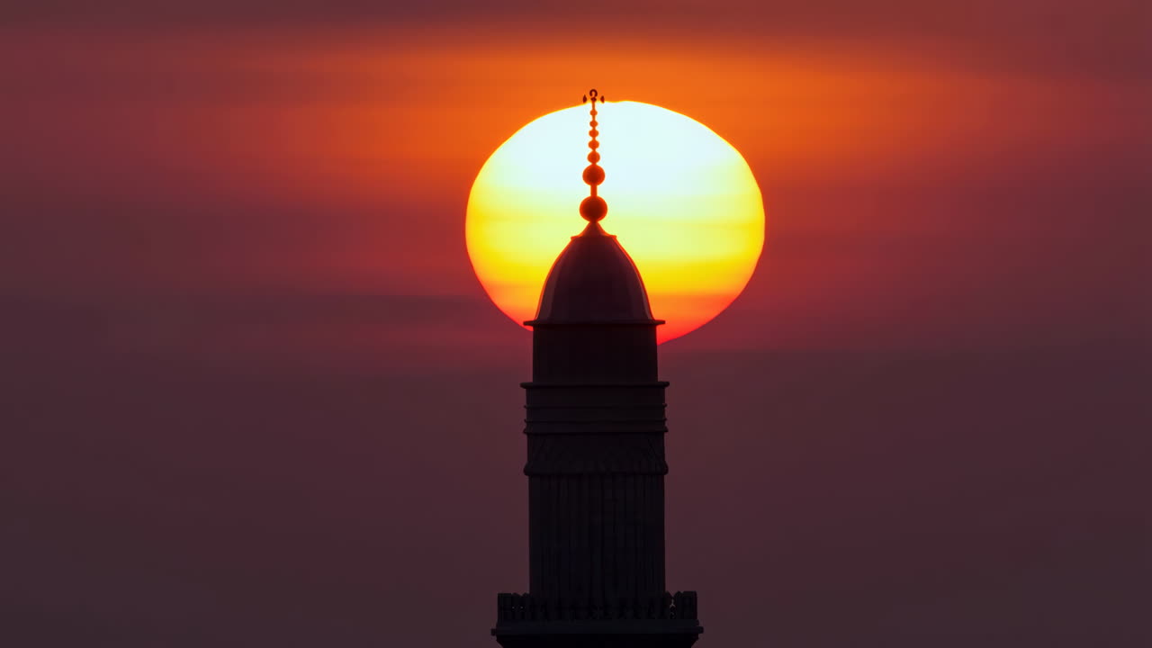 Minaret Silhouette Against a Fiery Sunset