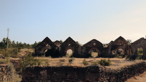 abandonded houses and ruins at sao domingo mine in portugal