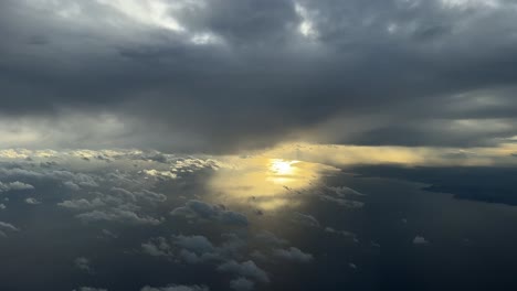 dramatic pilot point of view from a jet cockpit descending for the approach to valencia’s airport, overflying mediterranean sea