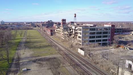 amazing aerial over the ruined and abandoned packard automobile factory near detroit michigan