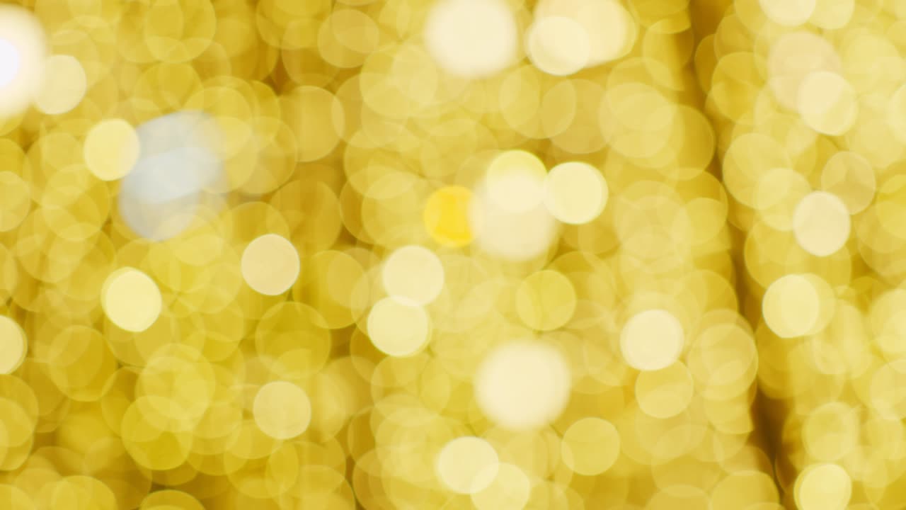 추상적인 황금색 보케 (bokeh) 의 멋진 장식적인 빛의 배경