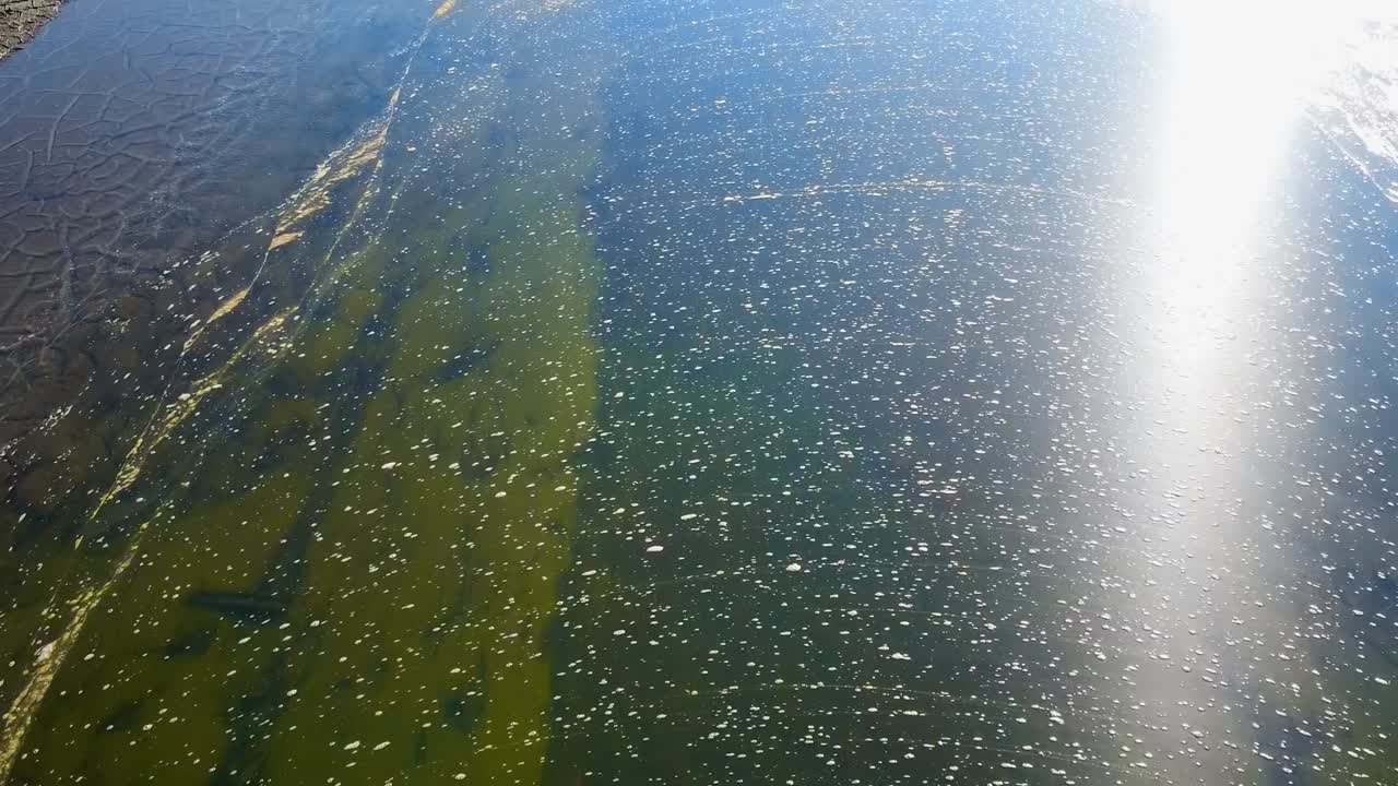 Aerial reveal of Zovnek Castle on lake of same name. Slovenia