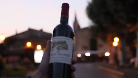 a bottle of wine in bordeaux at dusk