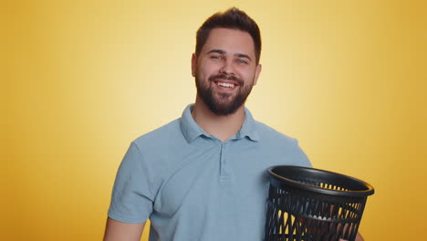 man taking off throwing out glasses into bin after medical vision laser treatment therapy surgery