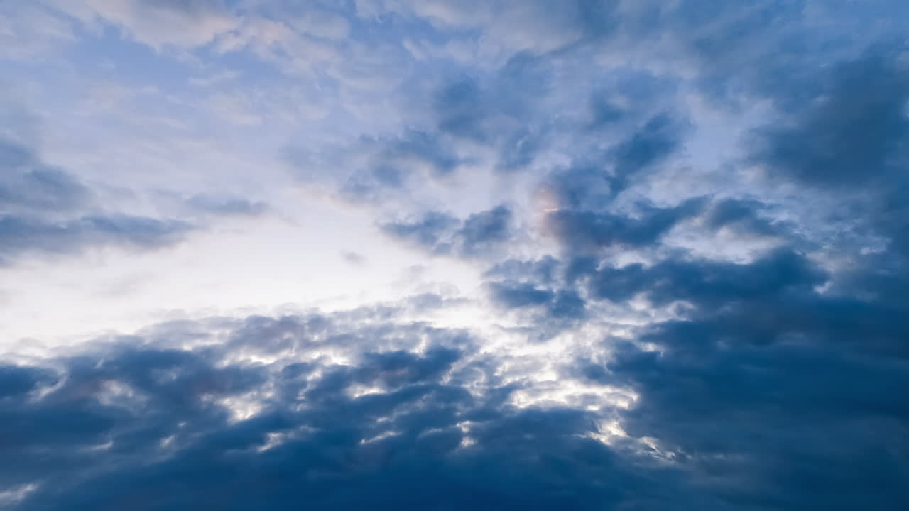 Summer blue sky with clouds timelapse. Flowing sunlight scenery sky.