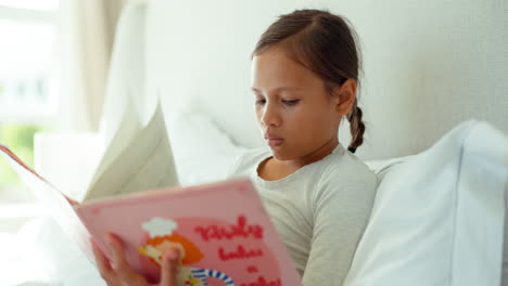 bed, reading and girl with book in home for story