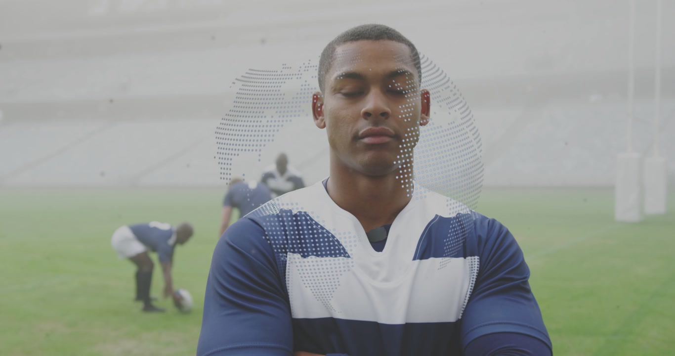 Dotted globe appearing on face rugby player standing arms crossed team warming by goal showing data