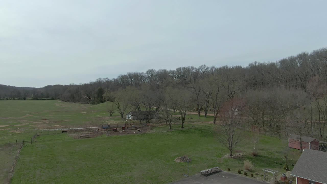 low altitude aerial reveal of a baptist church in the country side