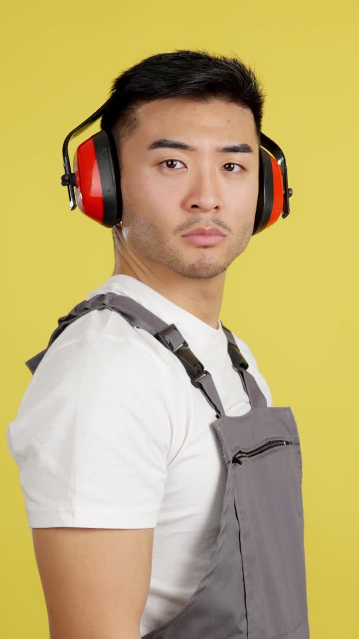 Construction worker with ear protection