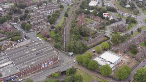 Drone-Shot-Following-Train-On-Railway-01