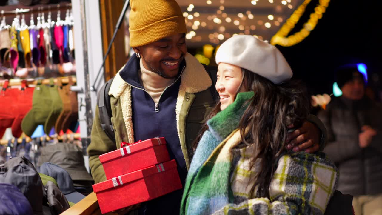 Couple Shopping for Gifts at Winter Street Market