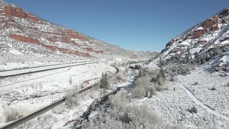 Flying-along-the-Eagle-River-with-Interstate-and-the-Grand-Army-of-the-Republic-highway-going-into-the-mountains