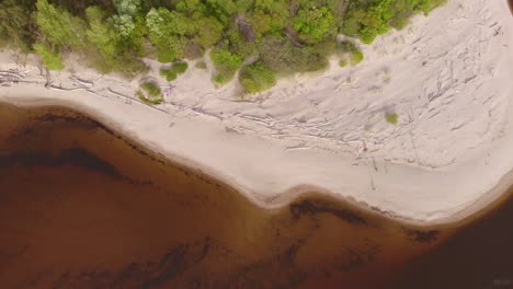 Empty-Carnikava-polluted-baltic-sea-waters-aerial-reveal