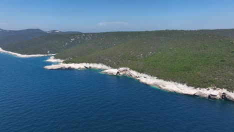 aerial pullback green island dugi otok and blue adriatic sea - croatia