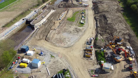 aerial flight over new constructions site on a canal lock development in the north of the uk