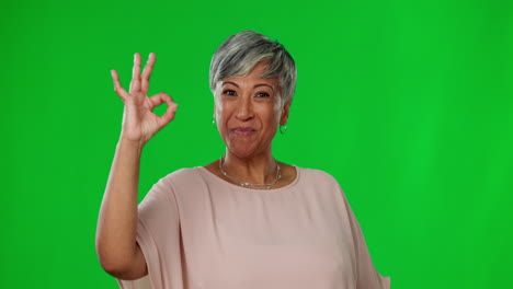 smile, green screen and okay hand gesture